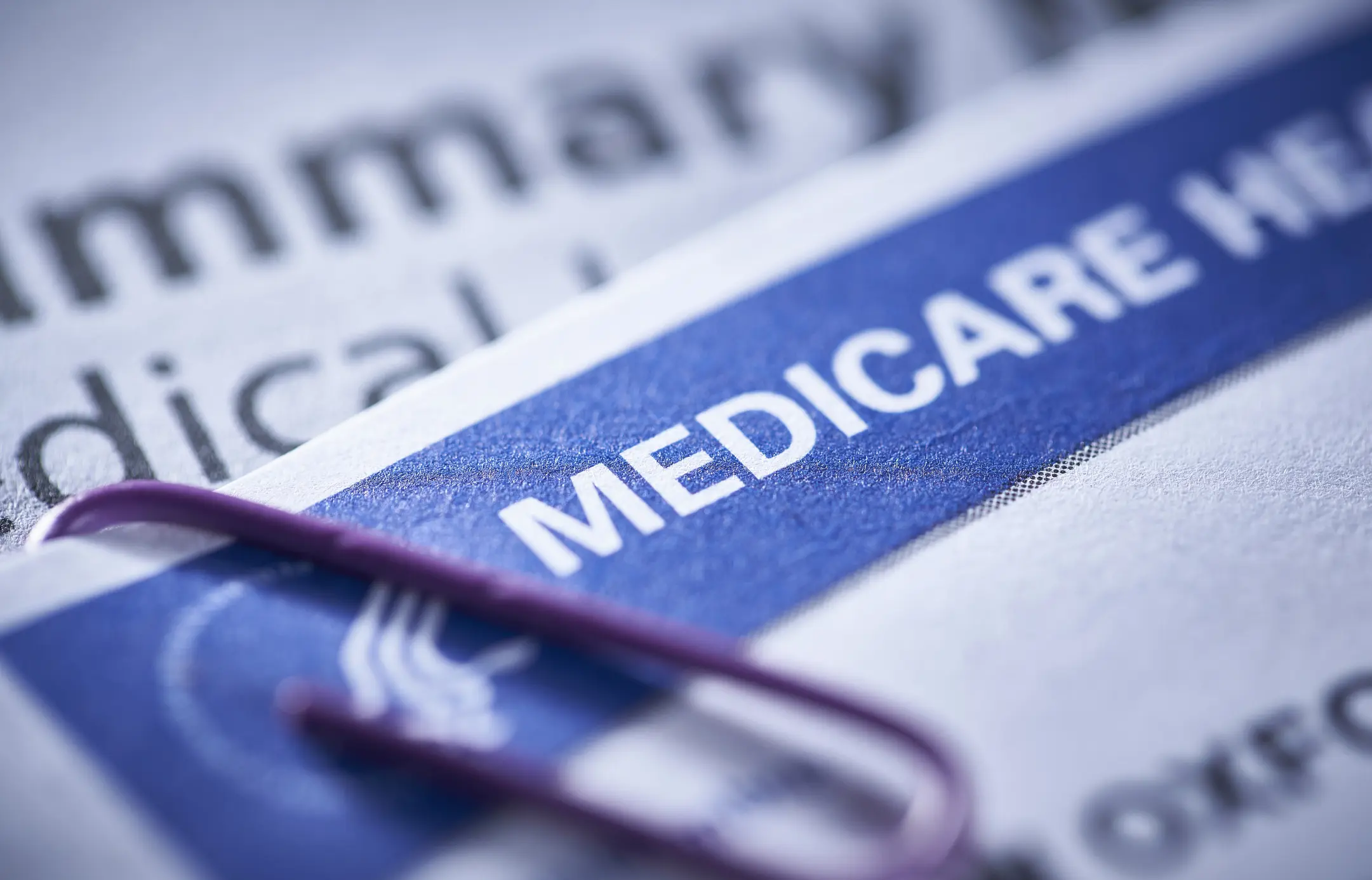 Close-up of Medicare card with paperclip